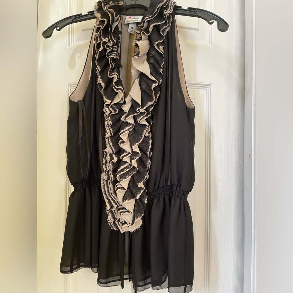 Super cute top from Neiman Marcus collection! Never worn